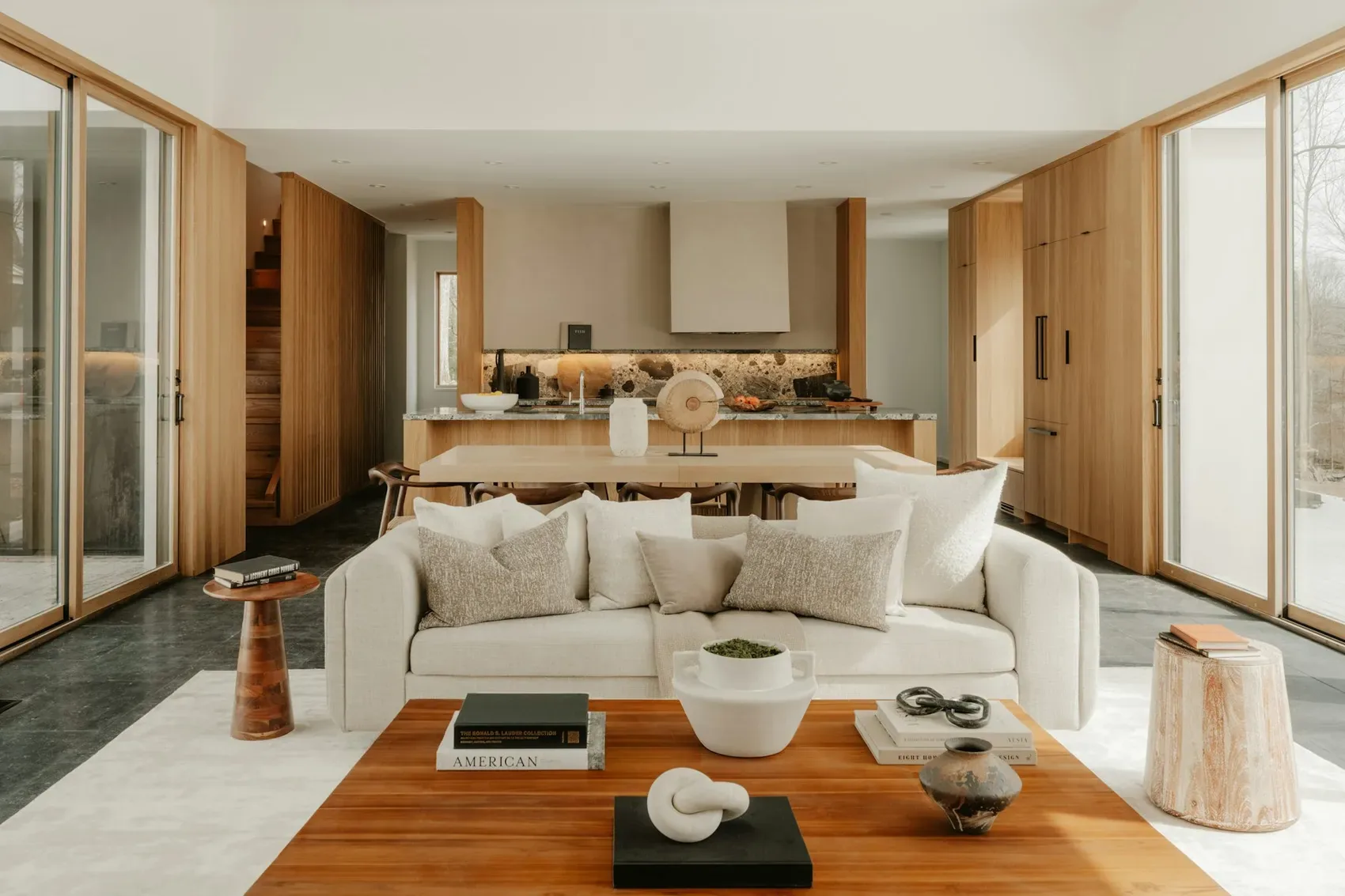 Renovated open-plan living room with warm wood accents